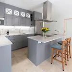 With Pool And Barbecue In The Center *